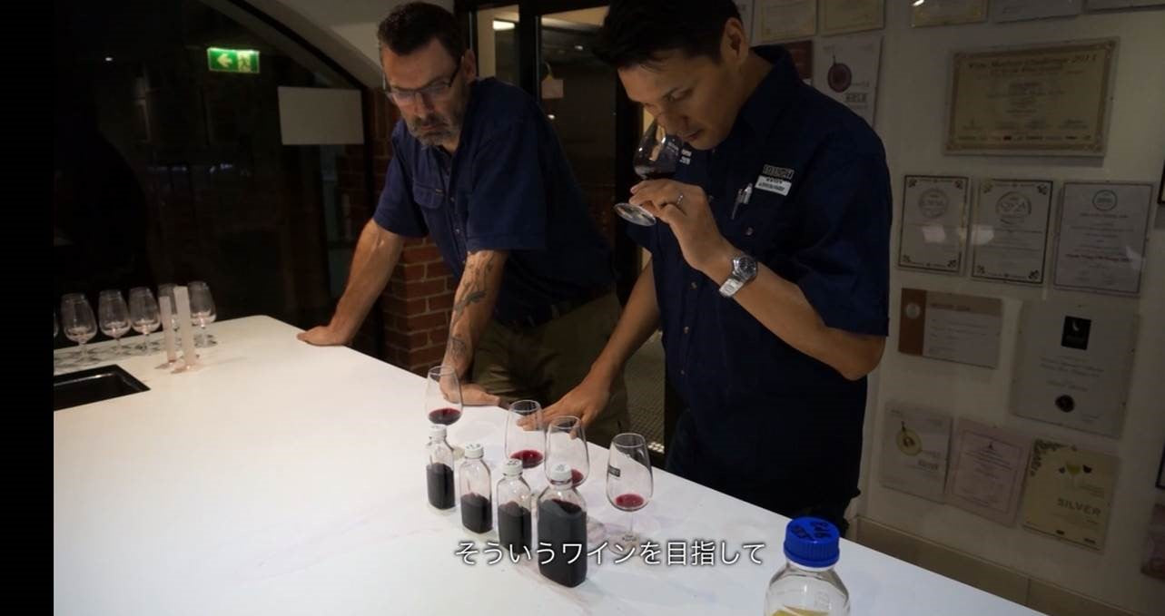 Winemakers smeeling wine aromatics in a glass