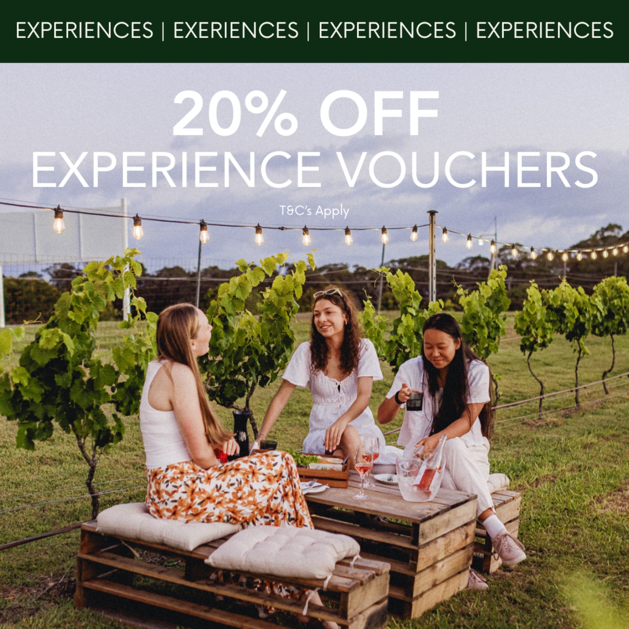 Three women enjoying a picnic in a vineyard with promotional text for experience vouchers.
