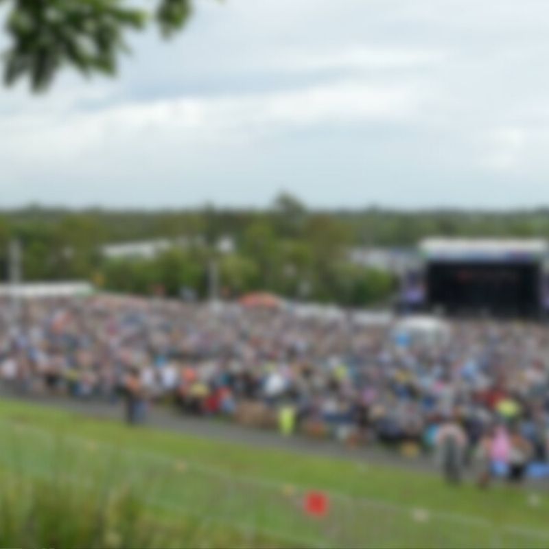 large crowd of people at a music event 