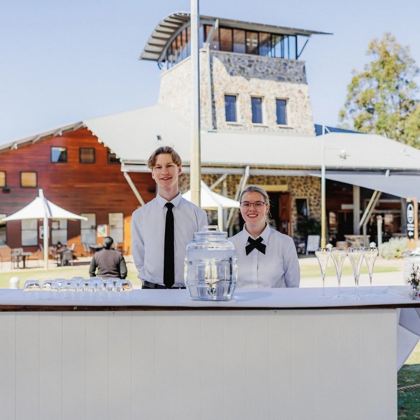 Sirromet waiters tending a private outdoor function