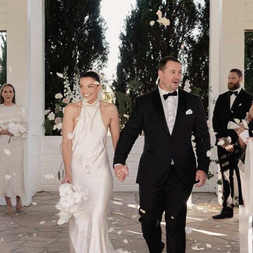 Bride and Groom ceremony walking down the aisle after being married