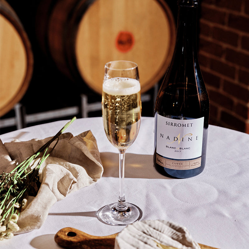 Bottle of wine and filled wine glass