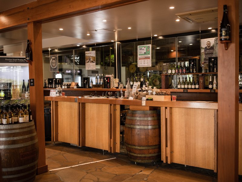 Inside the Cellar Door at Sirromet with wine shelves and fridges